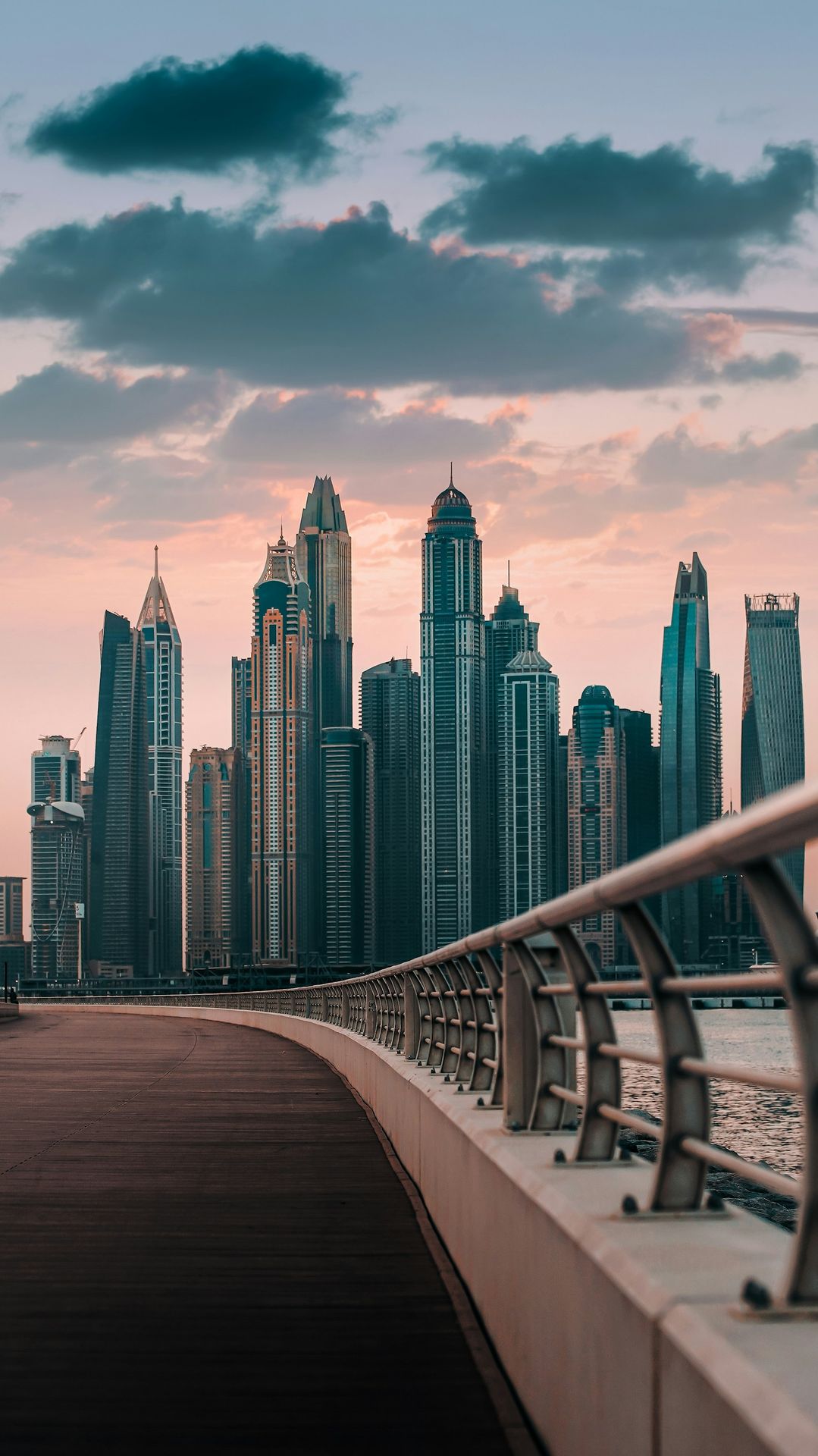 a city skyline with a bridge