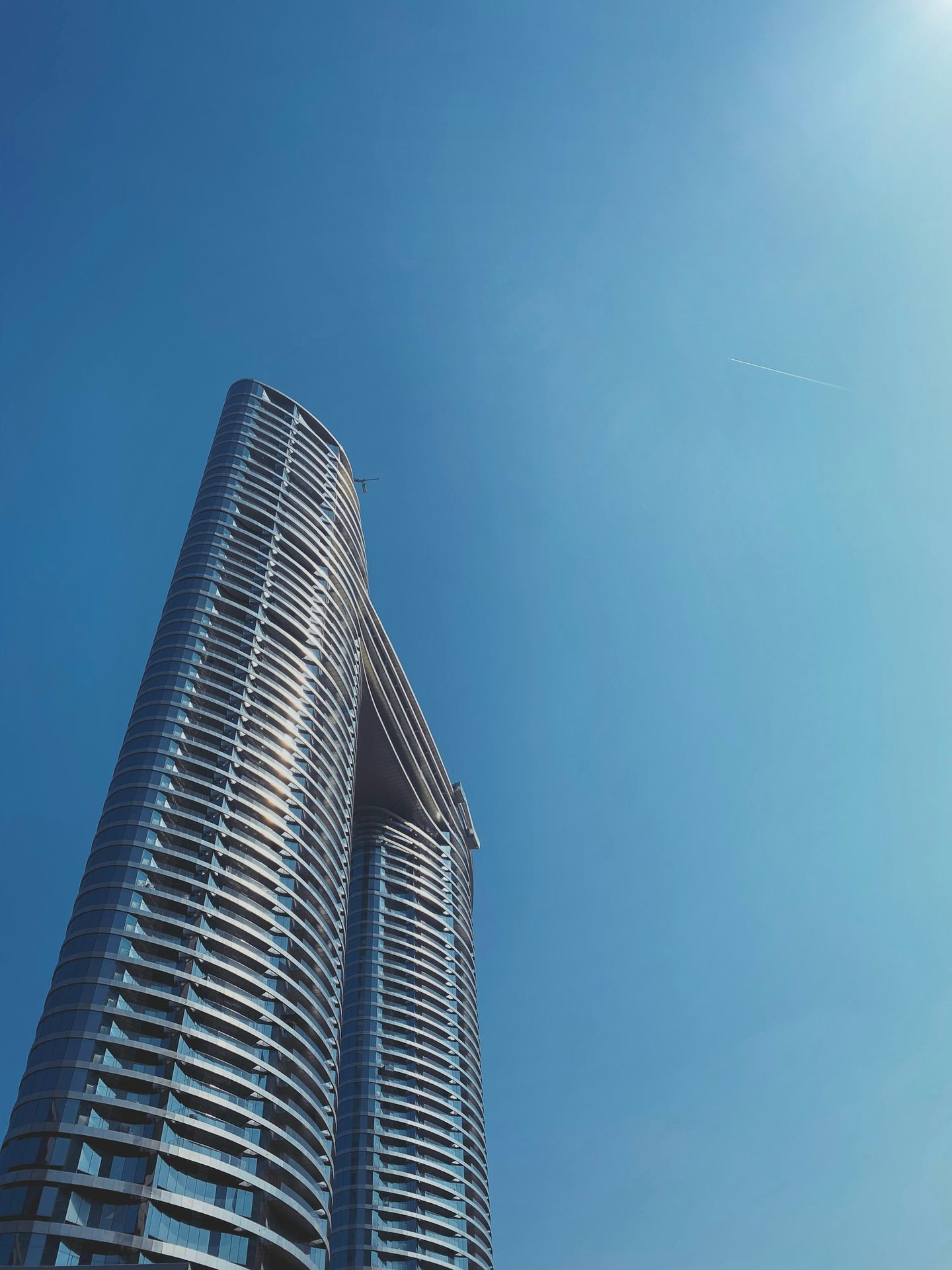 gray concrete building under blue sky during daytime